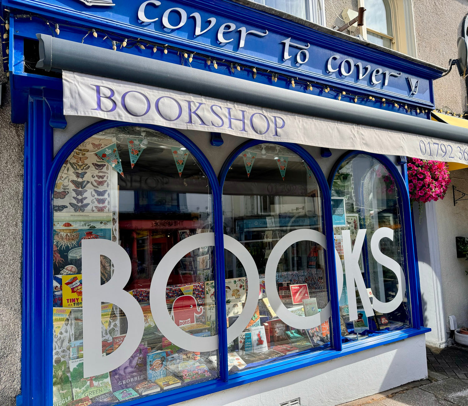 The Cover to Cover shop window on Newton Road, Mumbles